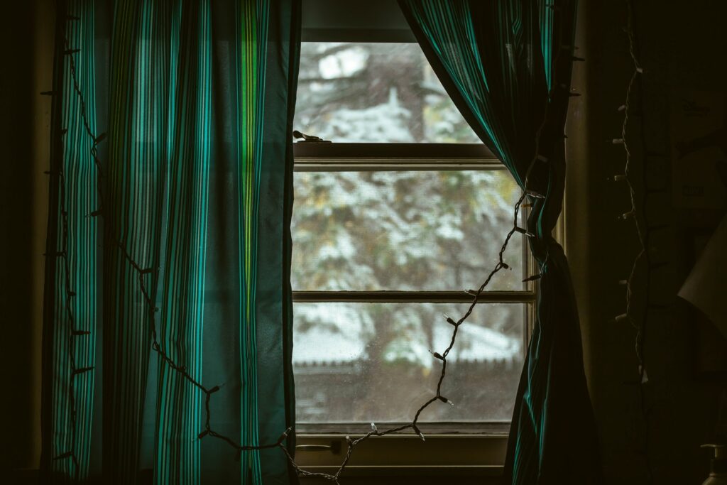 curtain at window with string lights
